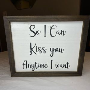 “So I can kiss you anytime I want” sign